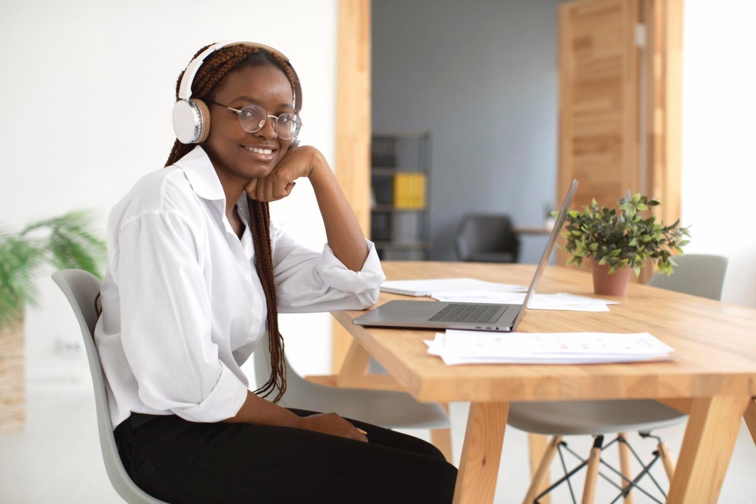 Professional barber demonstrating advanced cutting technique